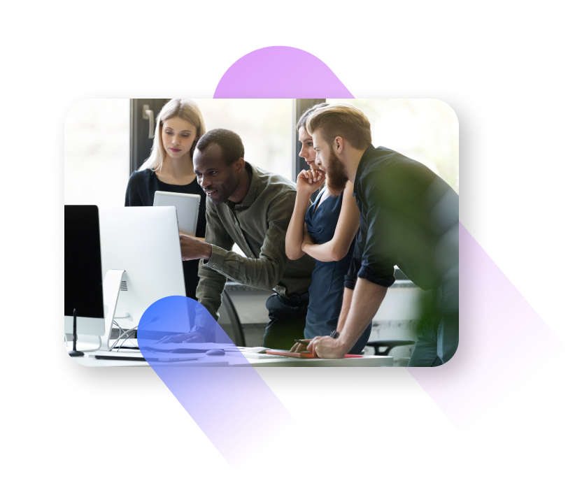Partner manager and consultant working together at a laptop