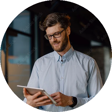 Professional reviewing telecom data on a tablet